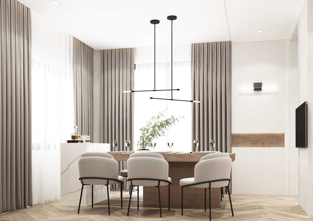The,Dining,Room,Is,Decorated,In,A,Minimalist,Style.,White
